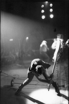 black and white photograph of a man on stage