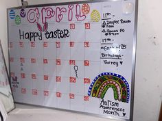 a calendar with the words happy easter written on it and an image of a rainbow