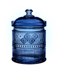 a blue glass jar with a lid