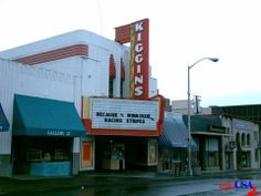 an old movie theater in the middle of town