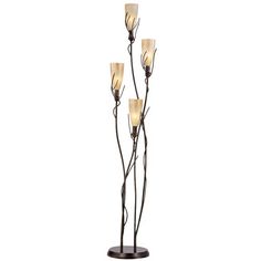 a floor lamp with four lights on it and flowers in the middle, against a white background