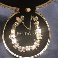 Bracelet 7.1 Include 19 Charms Box Cupcake, Girl,M, Gift Box,Pandora Bag,Giraffe,Love,Baby Carrier,Gift,Elephant,Dollar Bag,Luggage,Coffee Mug,Love Envelope,Buddha, Jewelry Box,Pink Mirando Charm, 1 Clo, 1 Spacer I Took It To Pandora Store Appraisal For $875 Luxury Silver Jewelry In Gift Box, Luxury Silver Jewelry For Birthday Gift, Luxury Charm Bracelet - Perfect Gift, Luxury Charm Bracelet For Gift, Luxury Charm Bracelet As Gift, Elegant White Bracelet For Birthday Gift, Luxury White Gold Charm Bracelet Gift, Silver Jewelry In Original Box For Anniversary, Elegant Silver Charm Bracelet For Gifting