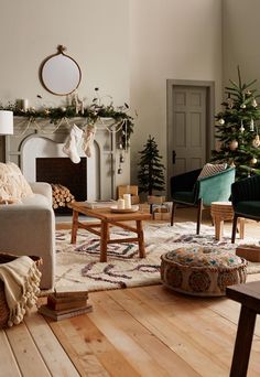 a living room filled with furniture and christmas trees