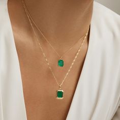 Charm your way through life with the Endless Emerald Necklace, a sublime selection from our Envy collection. With a link chain made from top-tier 925 sterling silver and plated with shimmering 14K gold, this enviable design exudes endless possibilities. The baguette cut emerald fusion stone is set in a matching 14K gold bordered base for a smooth style and glamorous addition to your ensembles. Metal: 925 Silver Plating: 14K Gold E-coated Length: 16"+ 2" Extension Stone: Emerald Fusion Stone Dainty Luxury Emerald Necklace As Birthstone, Luxury Hand-strung Rondelle Emerald Necklace, Emerald Necklace Silver, Stone Ring Design, Casual Jewelry, Emerald Necklace, Baguette Cut, Gems Jewelry, Jewellery Design