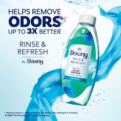 a bottle of downy hand sanitizer with blue water in it and the words, help remove odors up to 3x better rinse & refresh