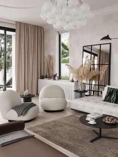 a living room filled with furniture and decor on top of a white flooring area