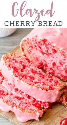 a loaf of cake with pink icing and cherries on top, sliced into slices