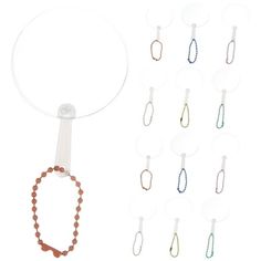 a string of beads and a beaded necklace are hanging from the side of a white hanger