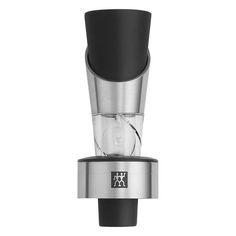 a silver and black coffee grinder on a white background