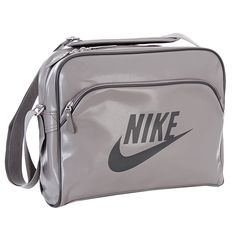 a gray nike bag with the word nike on it and a black nike logo is shown