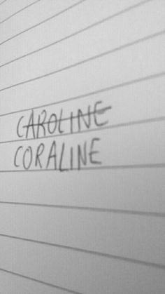 graffiti written on the side of a building that says carolina coraline in cursive writing