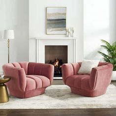 a living room with two chairs and a fire place in the corner, along with a rug on the floor