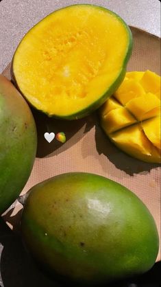 the mangoes are cut in half and ready to be eaten