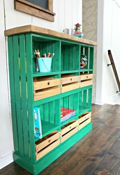 two pictures of the same green cabinet with drawers and shelves on each side, one is empty