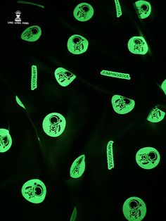 glow in the dark stickers are glowing green on a black background, and there is no image here to provide a caption for