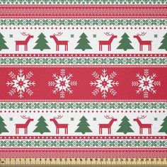 christmas sweater with deers and snowflakes in red, green and white colors