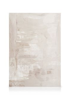 an abstract painting with white and beige colors on the wall, it looks like something out of