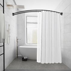 a white bath tub sitting next to a window