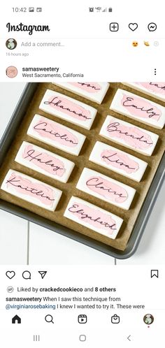 the cookies are decorated with pink icing and handwritten words on them, as well as hearts