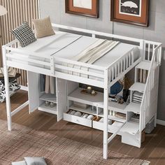 a white loft bed with stairs and storage underneath it in a room that has hardwood floors