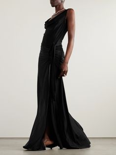 Though Rabanne is renowned for maximalist embellishments, its pared-back designs are just as striking. This gown is made from satin that's draped at the neckline and ties at the waist to create even more elegant texture. Wear yours with high heels to balance the floor-pooling hem. Cape Gown, Drape Maxi Dress, Maxi Jersey Dress, Satin Maxi, Satin Gown, Satin Maxi Dress, Black Gown, Maxi Dress Green, Silver Dress