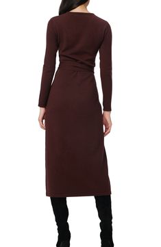 This quintessential wrap sweater-dress knit from luxe wool and cashmere features a sultry dipped neckline and waist-cinching sash. Surplice V-neck Long sleeves 70% wool, 30% cashmere Dry clean Imported Elegant Long Sleeve Cashmere Sweater Dress, Fall Evening Wrap Midi Dress, Evening Wrap Midi Dress For Fall, Fitted Cashmere Dresses For Fall, Fitted Long Sleeve Cashmere Dress, Elegant Cashmere Sweater Dress For Winter, Fitted Cashmere Sweater Dress For Fall, Long Sleeve Cashmere Work Dress, Long Sleeve Cashmere Dress For Work