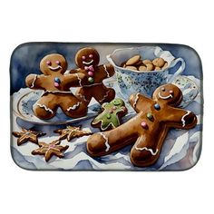 a painting of gingerbreads and cookies on a platter