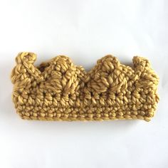 a crocheted object on a white surface