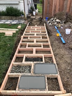 the back yard is being built and ready to be used as a garden bed for plants