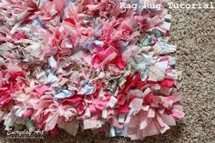 a pile of pink and blue fabric on the ground