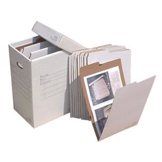 an open file box with several files in it next to a photo frame and folder