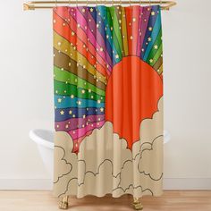 a colorful shower curtain with stars and clouds