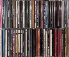 a rack full of various cd's and cds