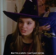 a woman wearing a witches hat with a caption that reads, but i'm a witch i can't just not be