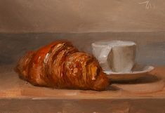 a painting of a croissant and coffee cup on a table top with a brown background