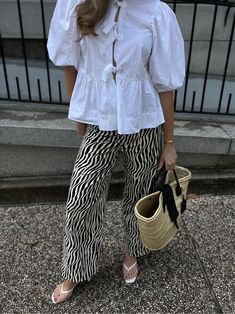 Shop Ganni Poplin Front-Tie Peplum … and other curated products on LTK, the easiest way to shop everything from your favorite creators. Ganni Peplum Top Outfit, Ganni Street Style, Ganni Blouse, Zebra Outfit, Peplum Top Outfits, Zebra Pants, Zebra Pant