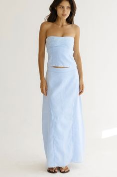 The Resort Maxi Skirt in Blue is designed to take you across occasions, this elevated essential is crafted from linen featuring intricate panelled detailing.Outer: 100% Linen (OEKO TEX Standard 100)Lining: 100% Global Organic Textile Standards (GOTS) Certified Organic Cotton Blue Linen Skirt, Summer Co Ords, Summer Set, Resort Collection, Linen Skirt, Bustier Top, Co Ords, Slow Fashion, Floral Embroidery