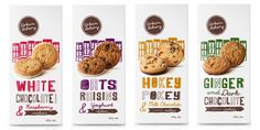 three milk cartons with cookies and chocolate chip cookies in the bottom one is white