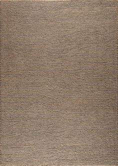 an area rug with brown and tan colors