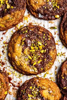 chocolate chip cookies with pistachios and sea salt sprinkled on top