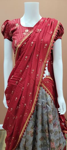 Attractive Banaras Digital Printed half saree set in Red and Grey. Blouse size : 32 Inches Lehenga length: 39 inches Red Georgette Pre-draped Saree With Pallu, Red Chanderi Pre-draped Saree With Unstitched Blouse, Red Chanderi Pre-draped Saree With Dupatta, Festive Red Cutdana Sets, Red Designer Pre-draped Saree For Navratri, Red Pre-draped Saree With Sheer Dupatta For Puja, Red Designer Wear Sets With Traditional Drape, Red Traditional Drape Sets For Designer Wear, Red Unstitched Pre-draped Saree For Diwali