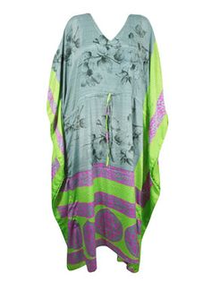 Boho Beach Kaftan, Gray, Green Floral, Silk Kaftan L-2X The Bohemian Summer Caftan, handmade from recycled silk saris is ideal for vacations or resort days. This relaxed kimono-style maxi dress is a combination of casual luxury and eco-conscious fashion. Featuring an adjustable drawstring waist and crafted from recycled materials, these boho dresses are great housedresses or versatile beach cover-ups. With the surge in popularity of boho weddings set against natural backdrops, the comfortable ka Summer Caftan, Bohemian Chic Style, Kimono Kaftan, Beach Kaftan, Dress Kaftan, Bohemian Chic Fashion, Casual Luxury, Silk Kaftan, Bohemian Summer