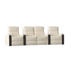 three reclining chairs with black legs and white upholstered seats on each side