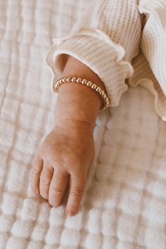 Chunky gold filled beaded baby bracelet Available sizes: Newborn-2 years (4"-5") 2-4 years (5"-5.5") 5-14 years (5.5"-6") Baby Bracelet Gold, Bracelets Outfit, Baby Doll Dress, Baby Bracelet, Girl Jewelry, Gold Baby, Little Outfits, Silver Sequin