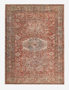 an antique rug with red and beige colors