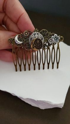 Celestial Hair comb  This Crescent Moon face Hair Comb makes a lovely hair accessory for beautiful hair styles. This haircomb is charming with elegant and amazing Flowers. It is great for special occasions like weddings, but can also be great for everyday wear ☻Link to More Hair Accessories: https://www.etsy.com/shop/FashionCrashJewelry?ref=profile_header&search_query=hair+accessories ☻Link to The ENTIRE SHOP: https://www.etsy.com/shop/FashionCrashJewelry?ref=shopsection_shophome_leftnav&ga_sear Sun Moon Hair Accessories, Celestial Hair Comb, Celestial Hair Accessories, Hair Accessories Vintage, Vintage Hair Combs, Face Hair, Head Accessories, Crescent Moon, Vintage Hairstyles