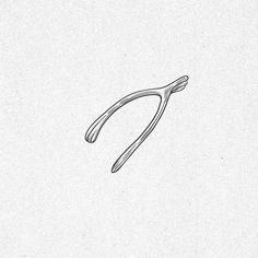 a black and white drawing of a pair of scissors