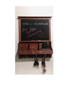 a chalkboard with keys hanging from it's sides and the words wall organizer for sale welcome