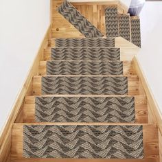 the carpeted stair treads are designed to look like waves