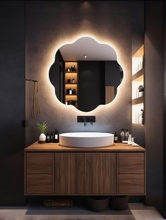 a bathroom with a round mirror above the sink and lights on the wall behind it